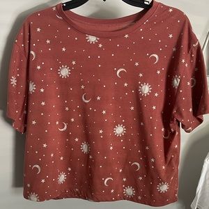 X Large Cropped Tshirt with sun, stars, and moon print.